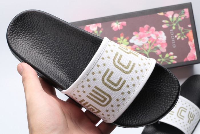G*u*i slippers